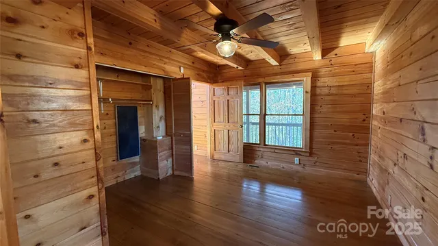 a view of livingroom with wooden floor