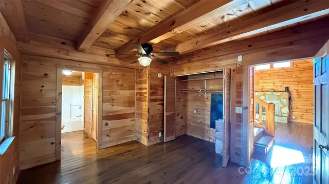 a view of a fireplace in an empty room