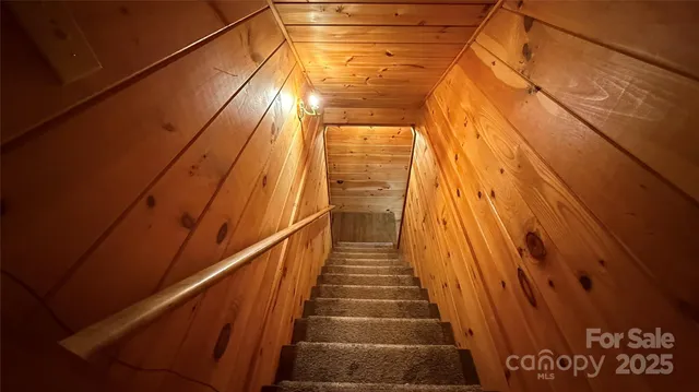 a bathroom with a tub and shower