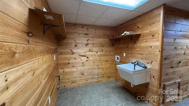 a bathroom with a tub and shower