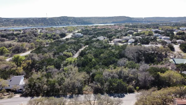 an aerial view of residential house and green space