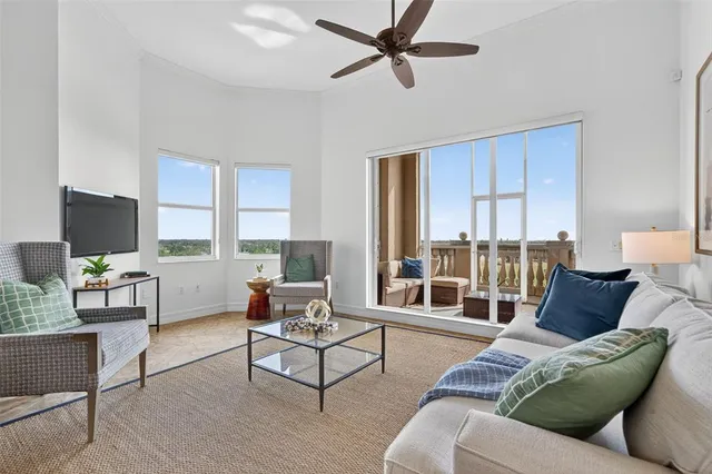 a large kitchen with stainless steel appliances granite countertop a stove a sink dishwasher and a refrigerator