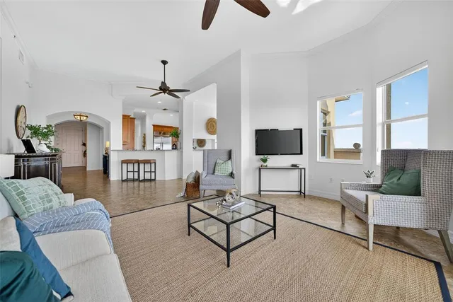 a kitchen with stainless steel appliances granite countertop a stove top oven a sink dishwasher and cabinets with wooden floor