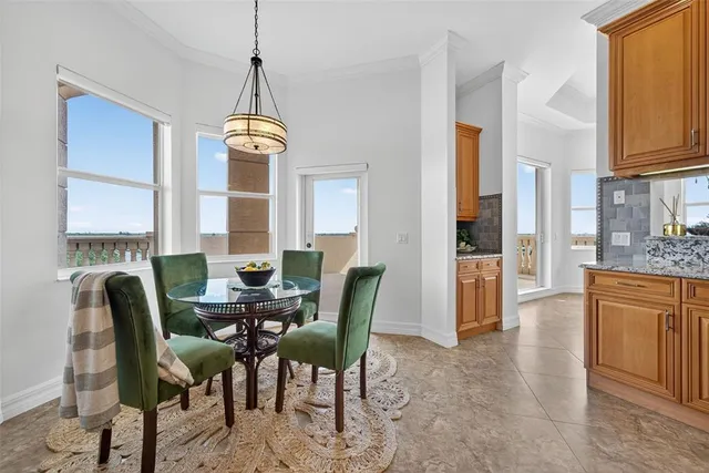 a bathroom with a granite countertop sink mirror and a bathtub