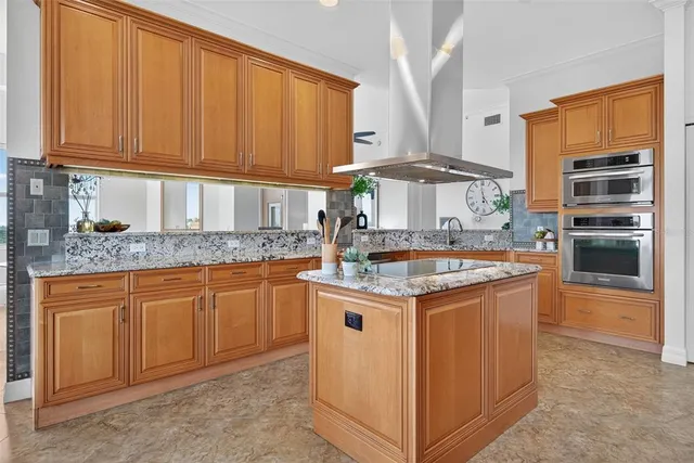 a bathroom with a sink a bathtub and a mirror