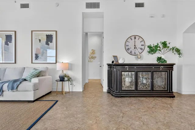 a bedroom with two beds and a dresser