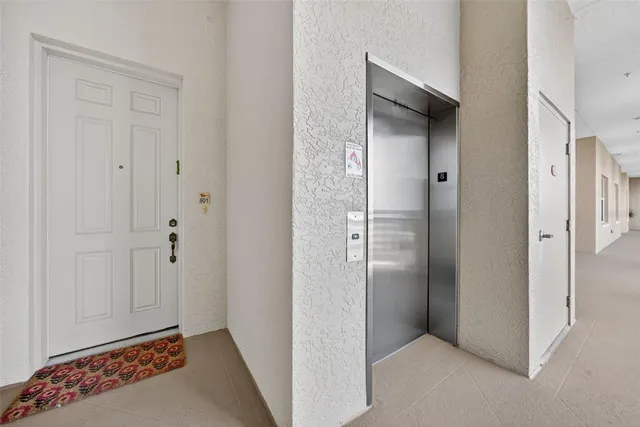 a view of a hallway with workspace