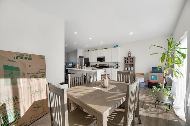 a view of a dining room with furniture