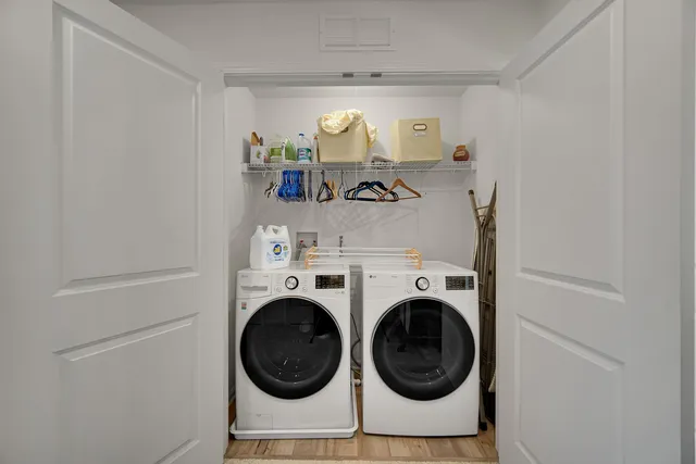 a utility room with dryer and washer
