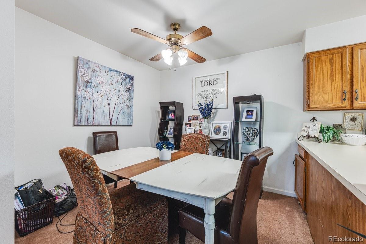 2166 35th Ave Court, Unit 14 Greeley, CO 80634 - Photo 15 of 33 a view of a dining room with furniture
