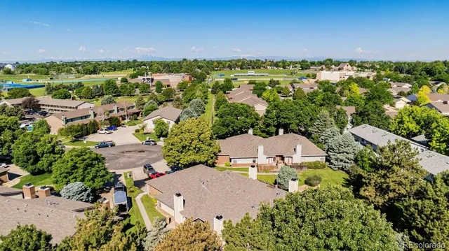 an aerial view of a swimming pool and outdoor space