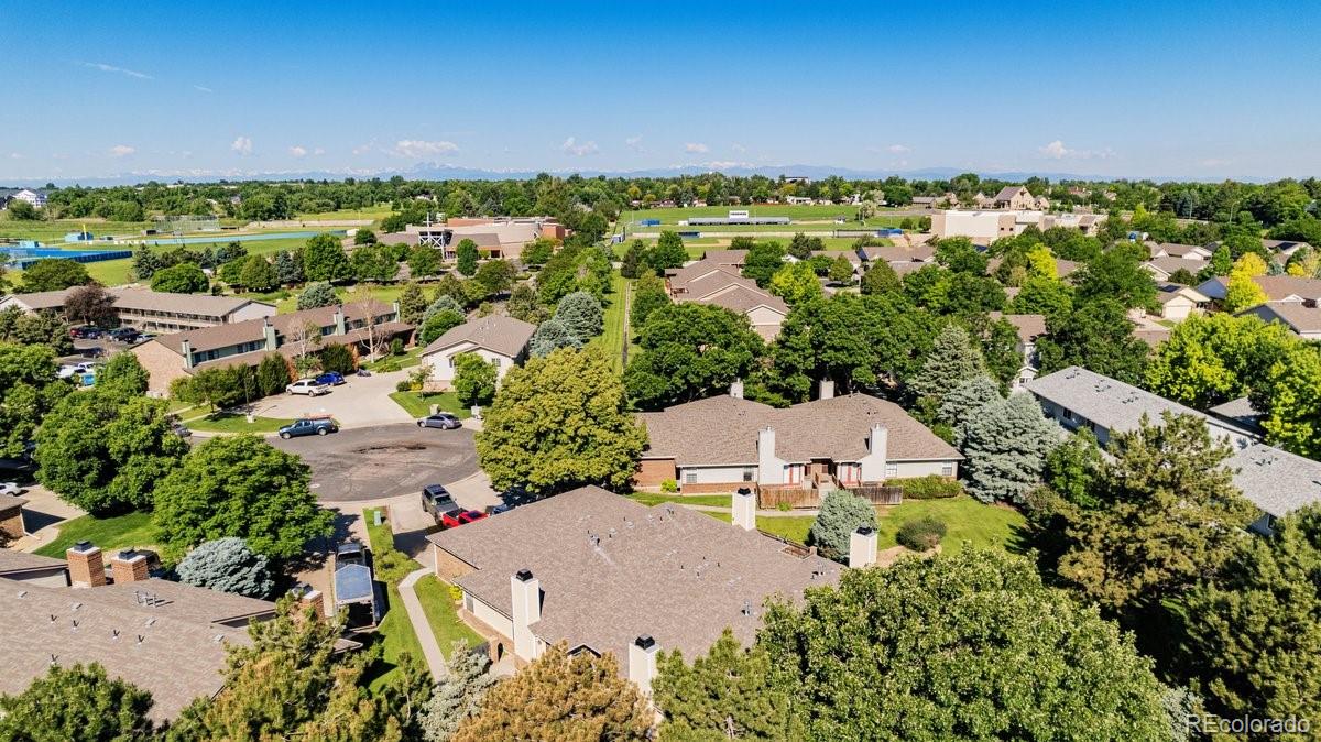 2166 35th Ave Court, Unit 14 Greeley, CO 80634 - Photo 29 of 33 an aerial view of a house with a yard
