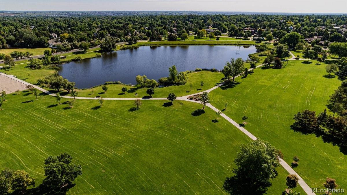 2166 35th Ave Court, Unit 14 Greeley, CO 80634 - Photo 33 of 33 a view of a lake with a houses