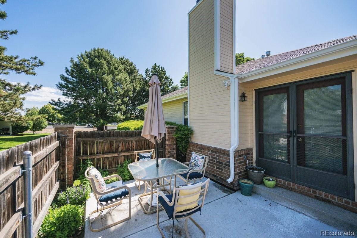 2166 35th Ave Court, Unit 14 Greeley, CO 80634 - Photo 5 of 33 a view of backyard with outdoor seating and plants