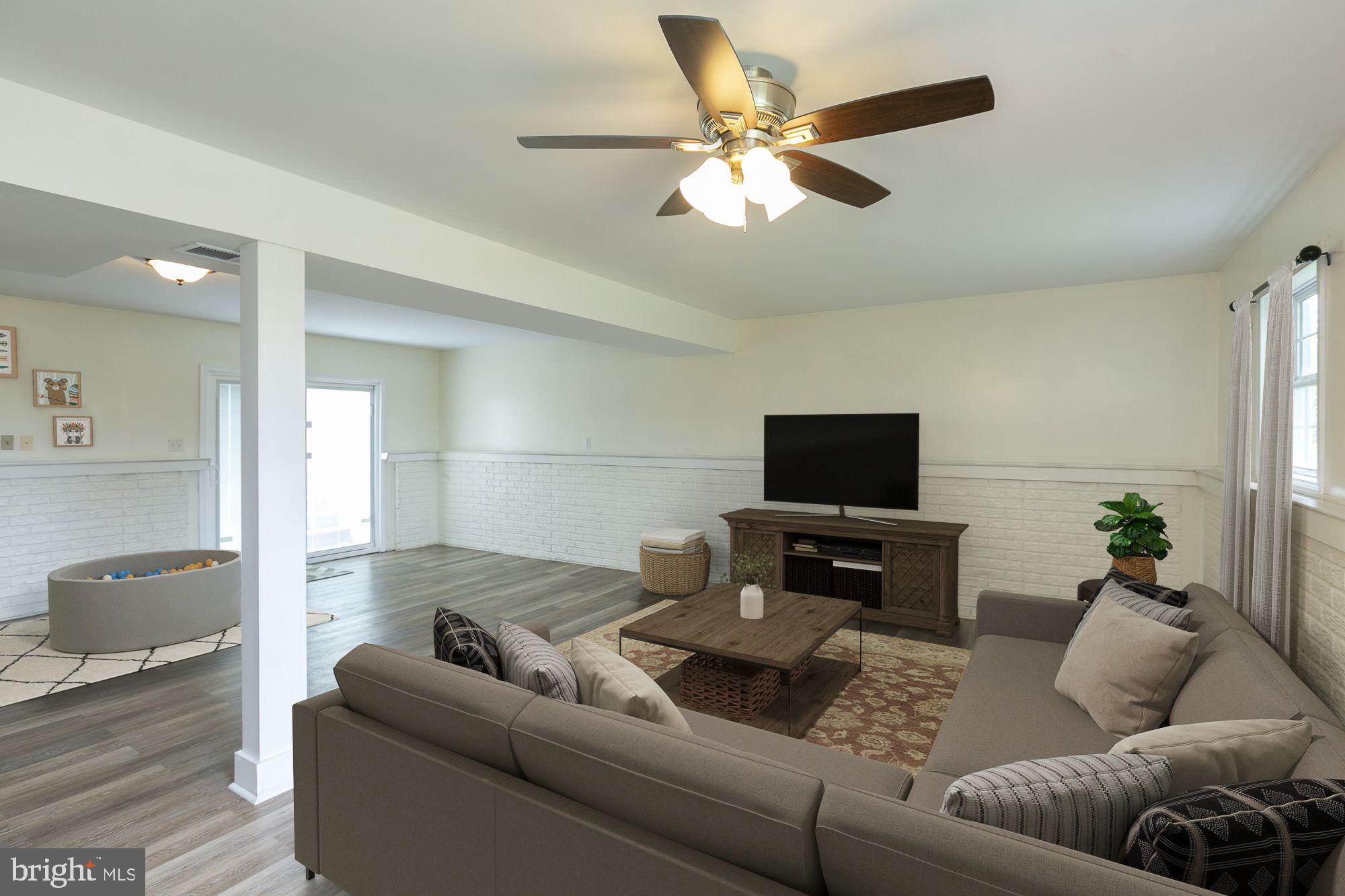 28 Roger Court Ranson, WV 25438 - Photo 27 of 33 Lower level Rec room