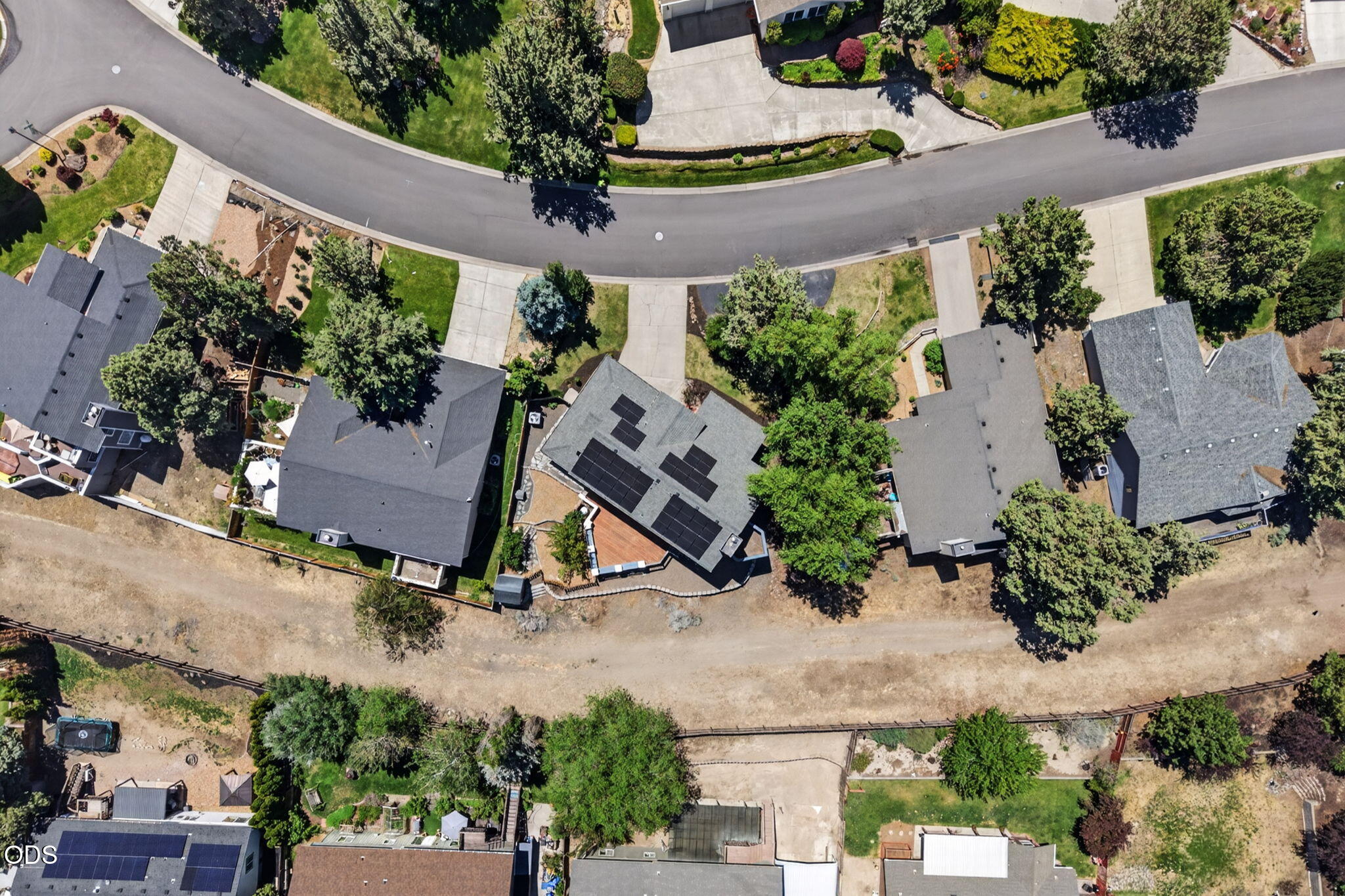 2486 Southwest Valleyview Drive Redmond, OR 97756 - Photo 49 of 55 an aerial view of a house with a yard and potted plants
