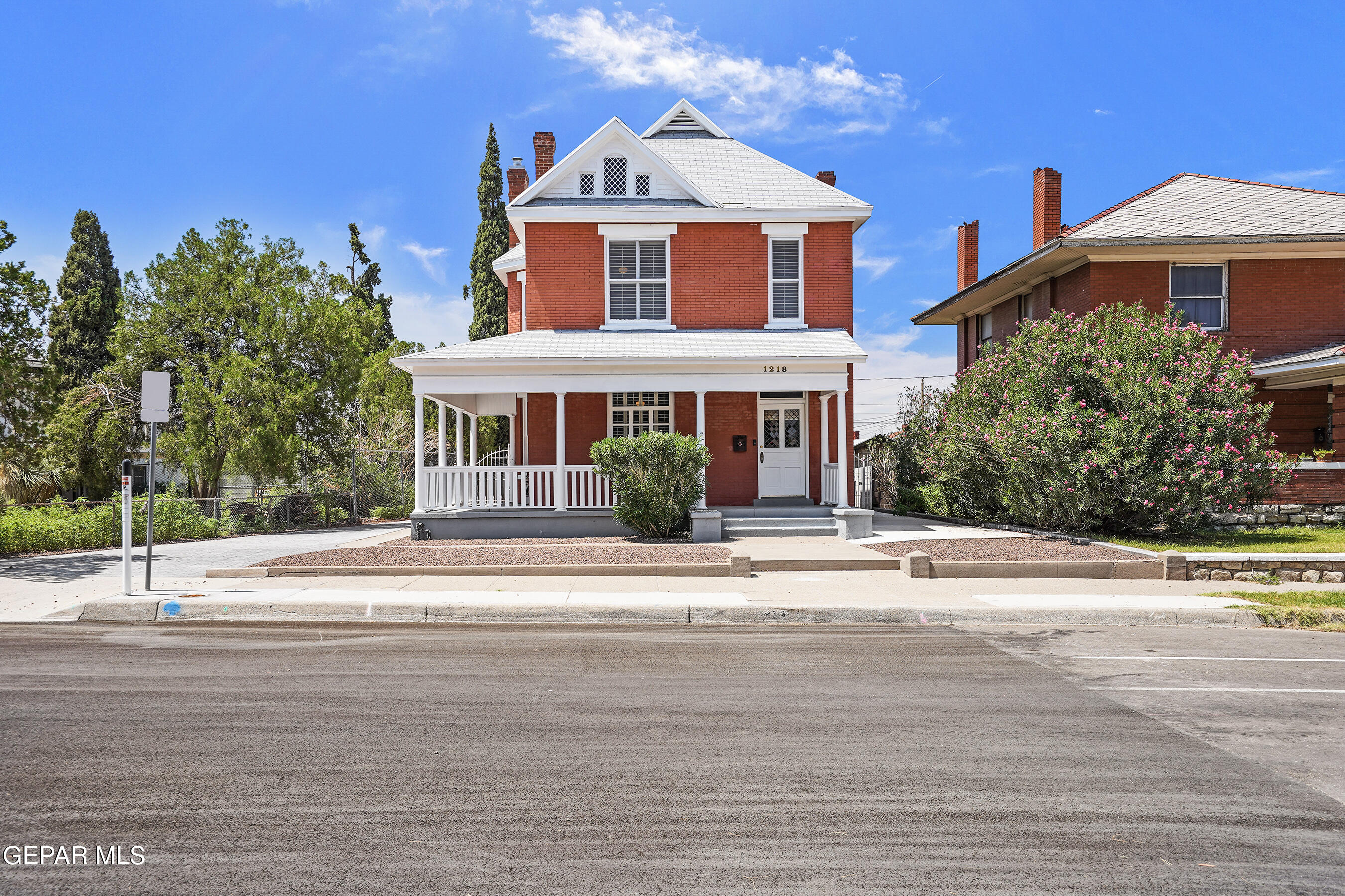 1218 Prospect Street El Paso, TX 79902 - Photo 1 of 43 a front view of a house with a yard