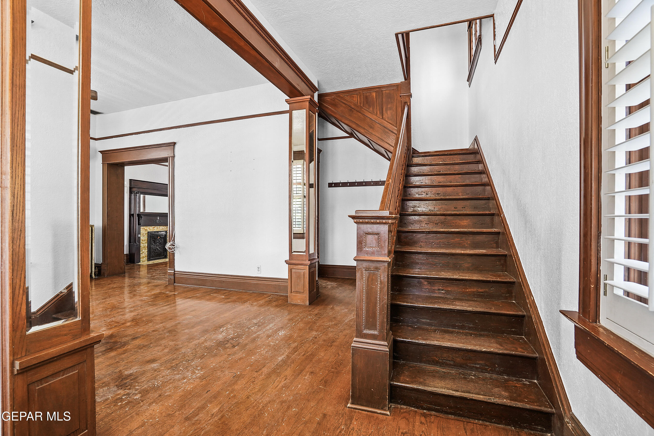 1218 Prospect Street El Paso, TX 79902 - Photo 5 of 43 a view of an entryway with wooden floor and door