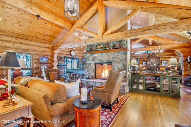 a view of a patio with table and chairs