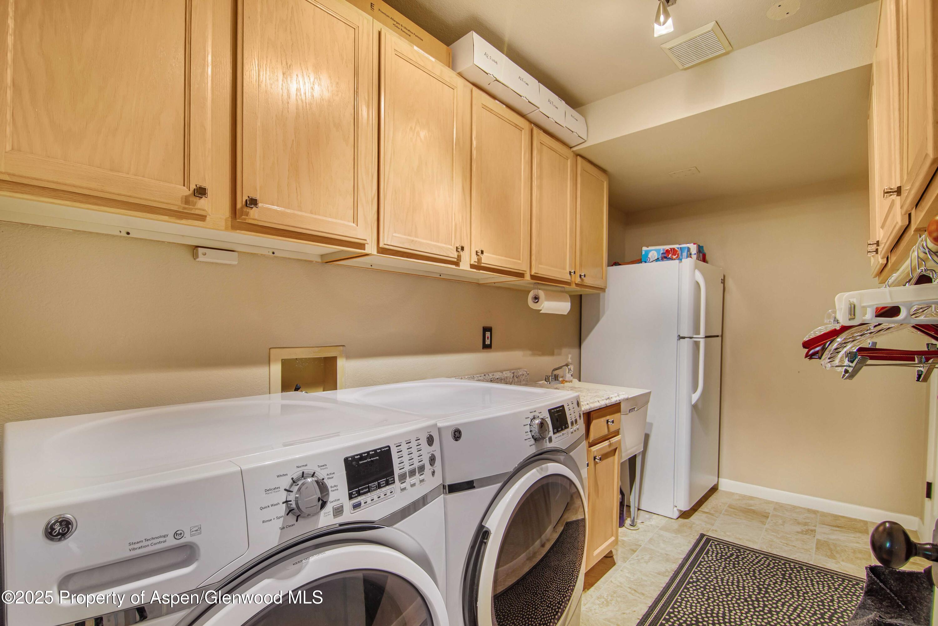 1637 Emma Spur Basalt, CO 81621 - Photo 34 of 45 a utility room with dryer and washer