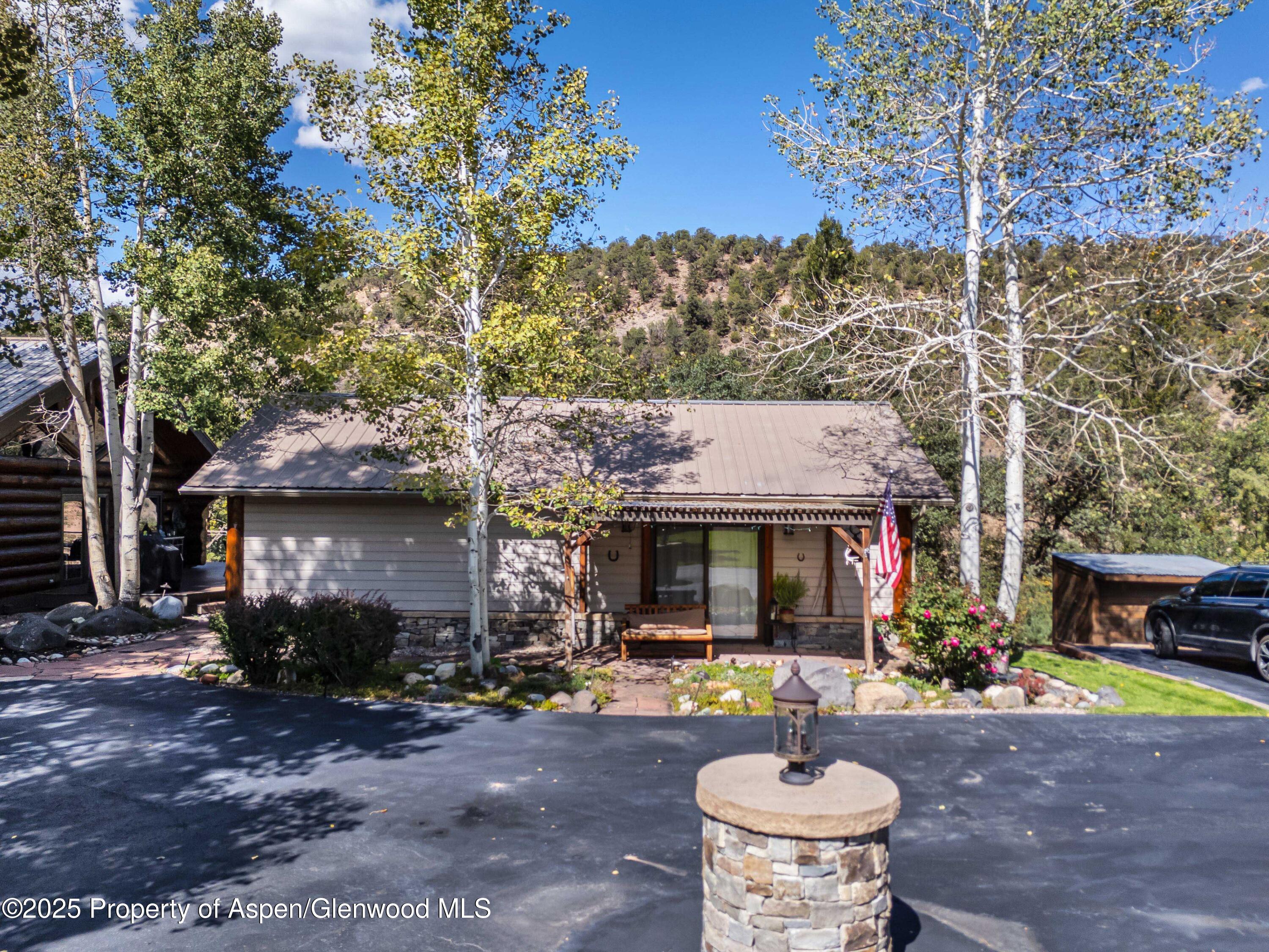 1637 Emma Spur Basalt, CO 81621 - Photo 35 of 45 a front view of a house with garden