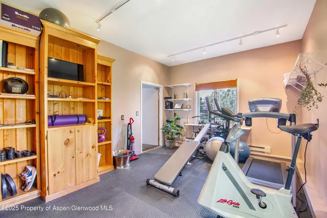 a view of a room with gym equipment