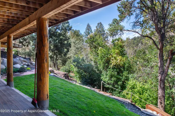 a bedroom with a bed and a television in closet