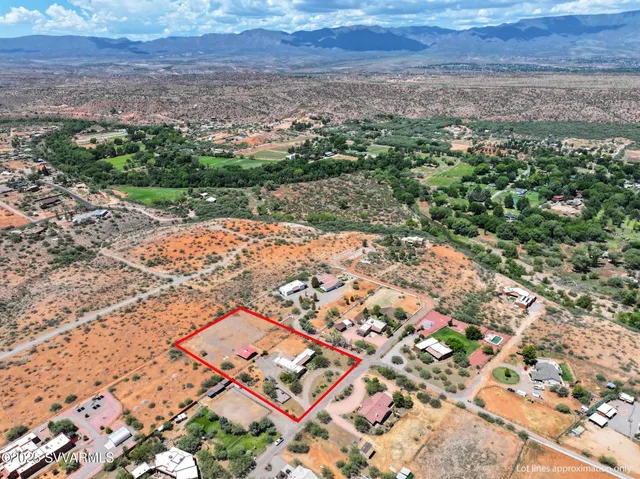 a room with a sink and a mirror
