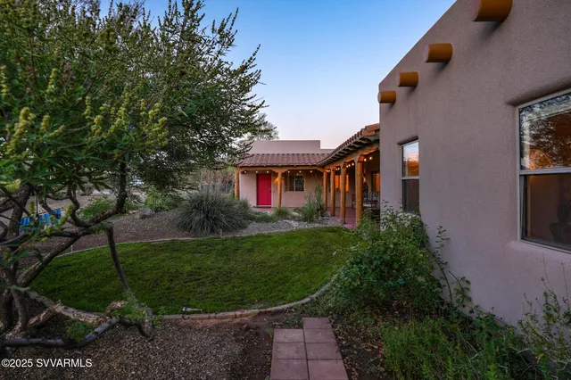 a view of a garden with a lake
