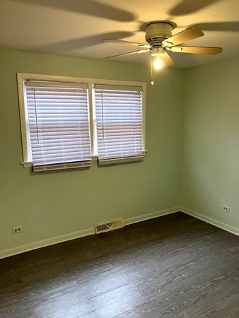 a view of a room that has a window in it