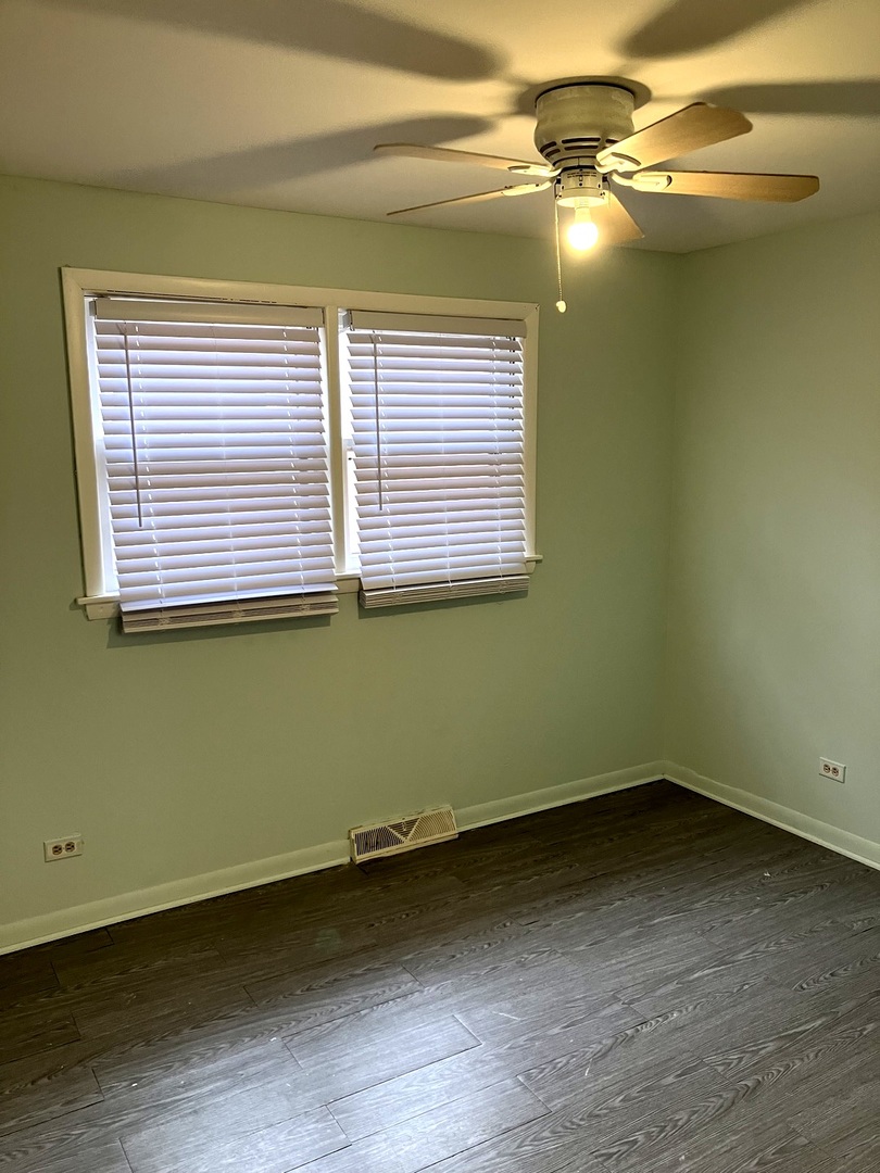 840 East 89th Street Chicago, IL 60619 - Photo 12 of 27 a view of a room that has a window in it