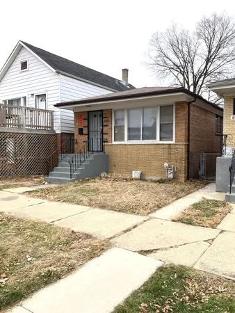 a front view of a house with a patio