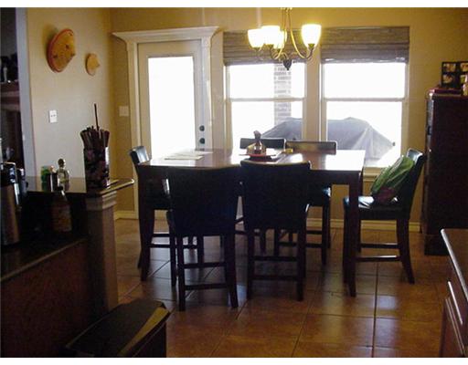 6850 Round Table Street Corpus Christi, TX 78414 - Photo 4 of 4 a view of a dining room with furniture window and outside view