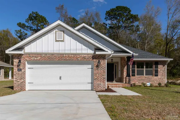 a view of house with garden
