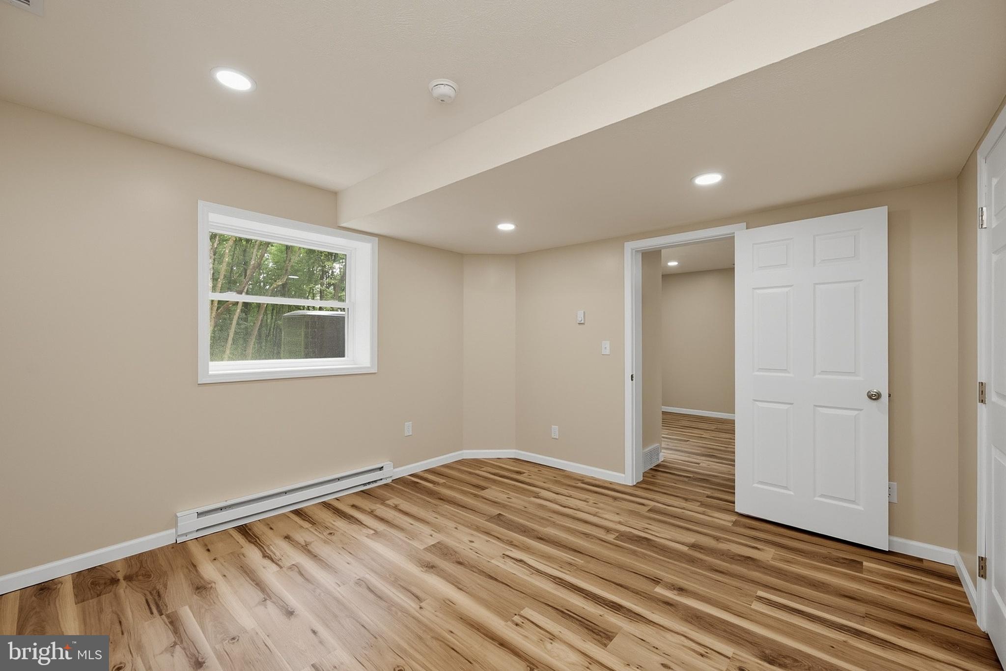 114 Dripping Spring Road Morgantown, WV 26508 - Photo 100 of 102 a view of empty room with wooden floor and fan