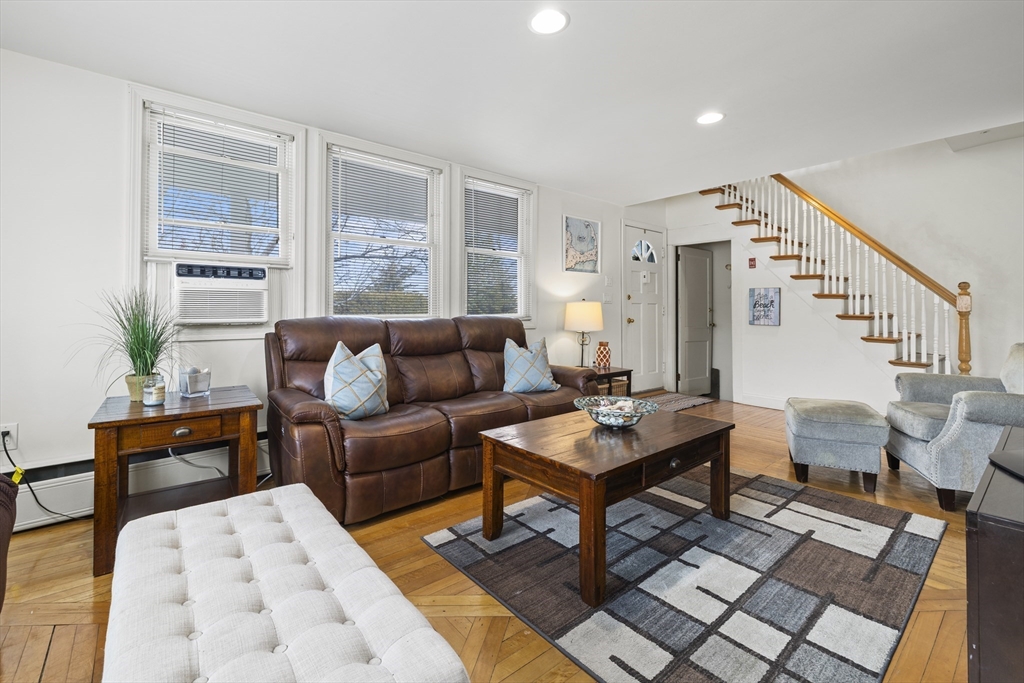 169 Gosnold Street Barnstable, MA 02601 - Photo 11 of 40 a living room with furniture and wooden floor