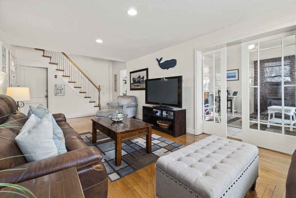 169 Gosnold Street Barnstable, MA 02601 - Photo 12 of 40 a living room with furniture and a flat screen tv