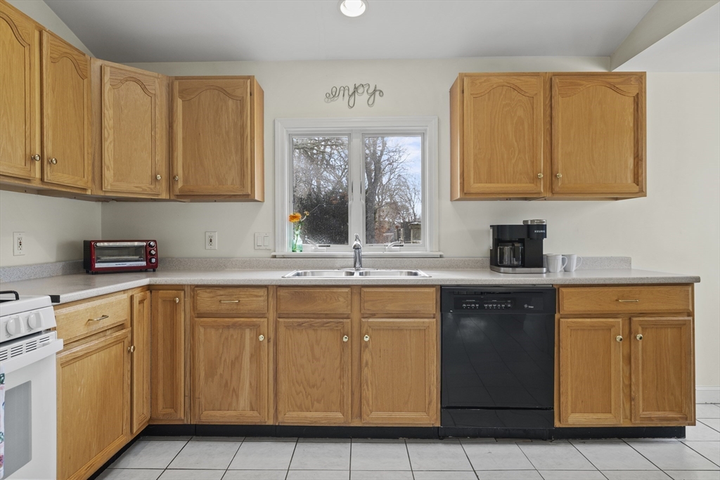 169 Gosnold Street Barnstable, MA 02601 - Photo 3 of 40 a kitchen with cabinets and window