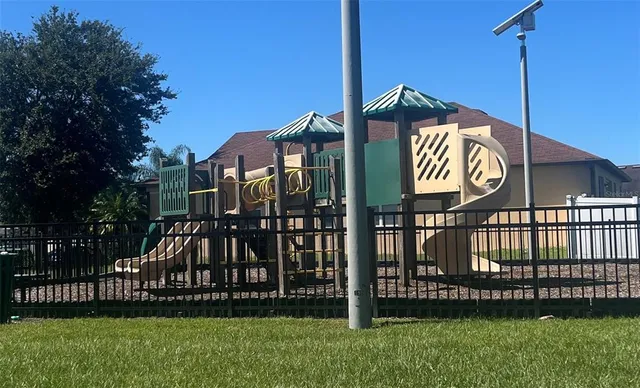 a view of a park with a sign board