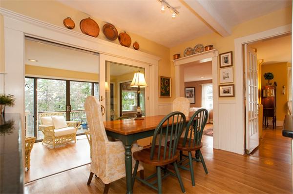 232 Edge Hill Road Milton, MA 02186 - Photo 11 of 23 a dining room with furniture and wooden floor