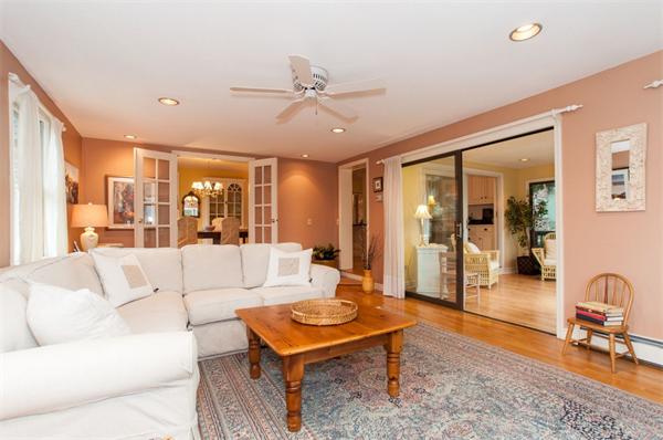 232 Edge Hill Road Milton, MA 02186 - Photo 12 of 23 a living room with furniture and a large window