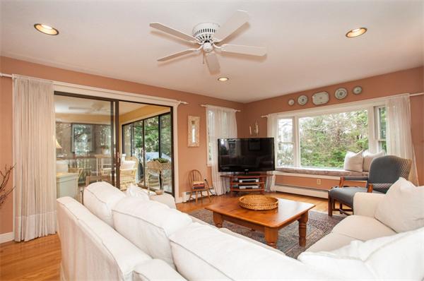 232 Edge Hill Road Milton, MA 02186 - Photo 13 of 23 a living room with furniture and a flat screen tv