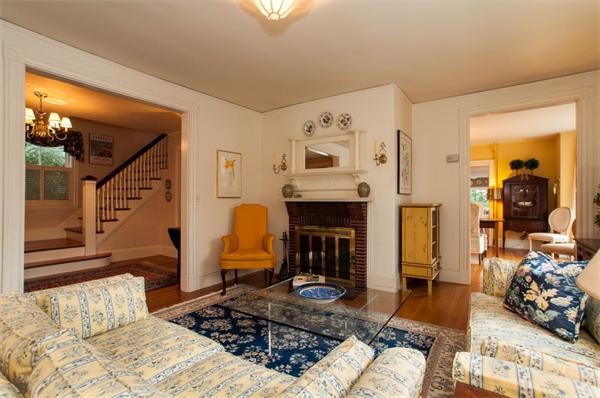 232 Edge Hill Road Milton, MA 02186 - Photo 5 of 23 a bedroom with furniture and a fireplace