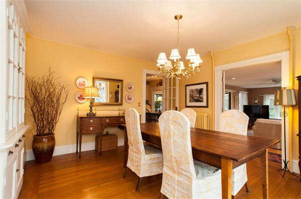 232 Edge Hill Road Milton, MA 02186 - Photo 8 of 23 a view of a dining room with furniture and chandelier