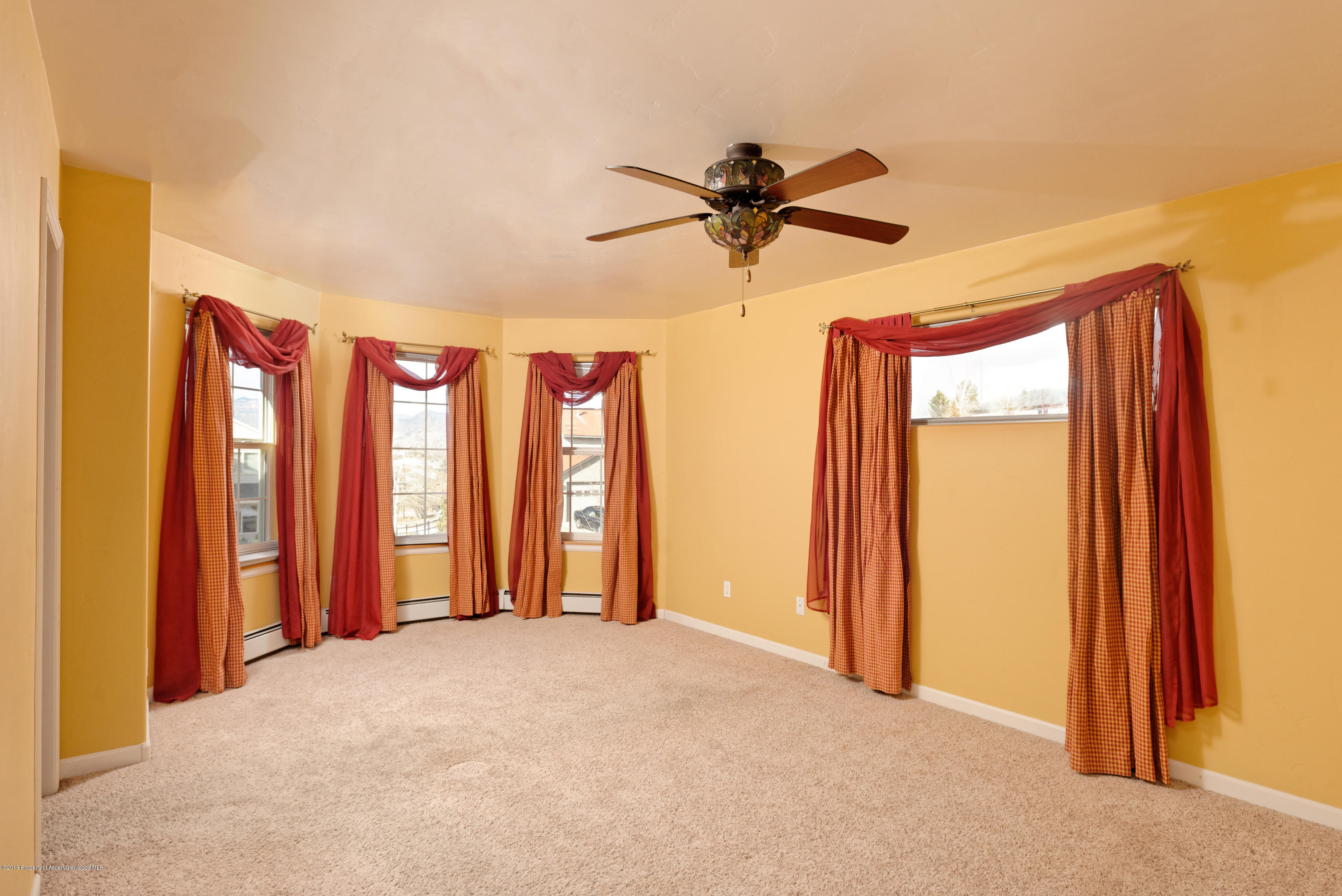 1371 Firethorn Drive Rifle, CO 81650 - Photo 8 of 16 a view of livingroom with furniture and a ceiling fan