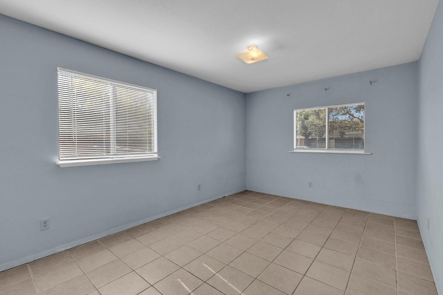 1714 Pole Line Road Davis, CA 95618 - Photo 16 of 24 an empty room with windows