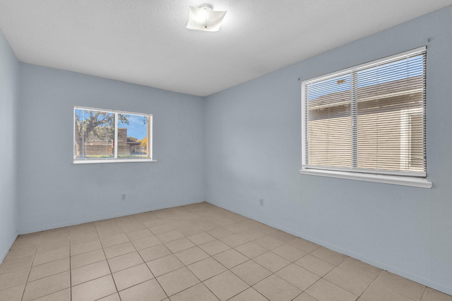 1714 Pole Line Road Davis, CA 95618 - Photo 18 of 24 a view of an empty room with a window