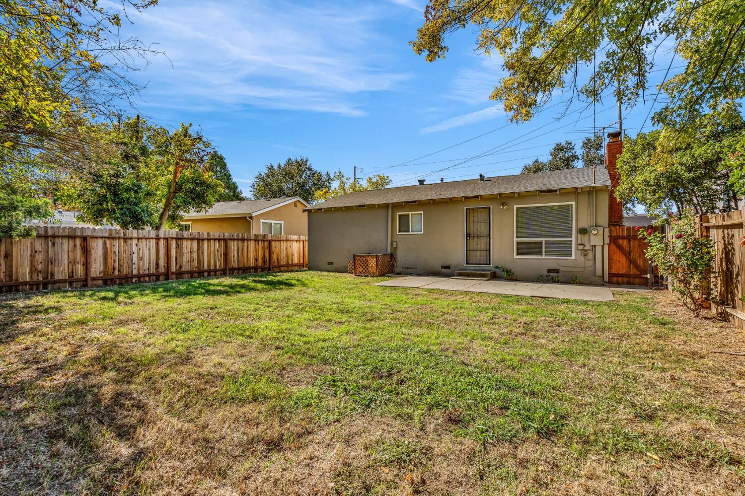 1714 Pole Line Road Davis, CA 95618 - Photo 23 of 24 a front view of a house with a garden