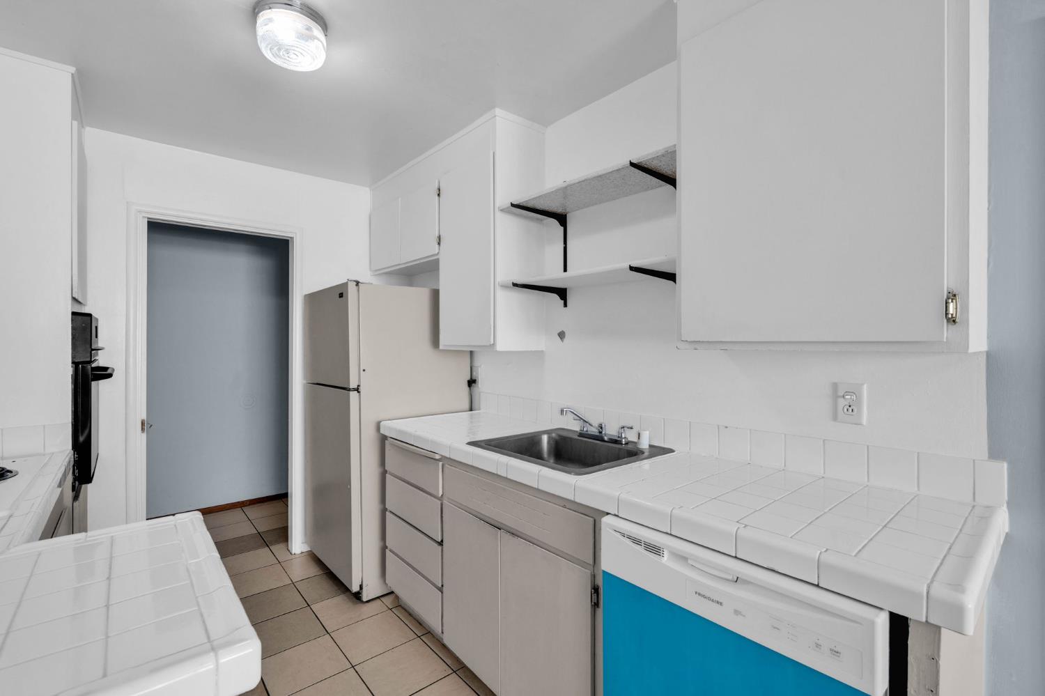 1714 Pole Line Road Davis, CA 95618 - Photo 9 of 24 a kitchen with cabinets appliances and a sink