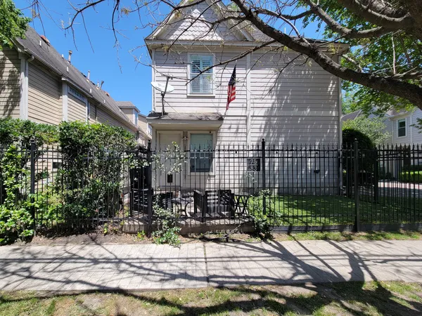 a view of a backyard with a garden